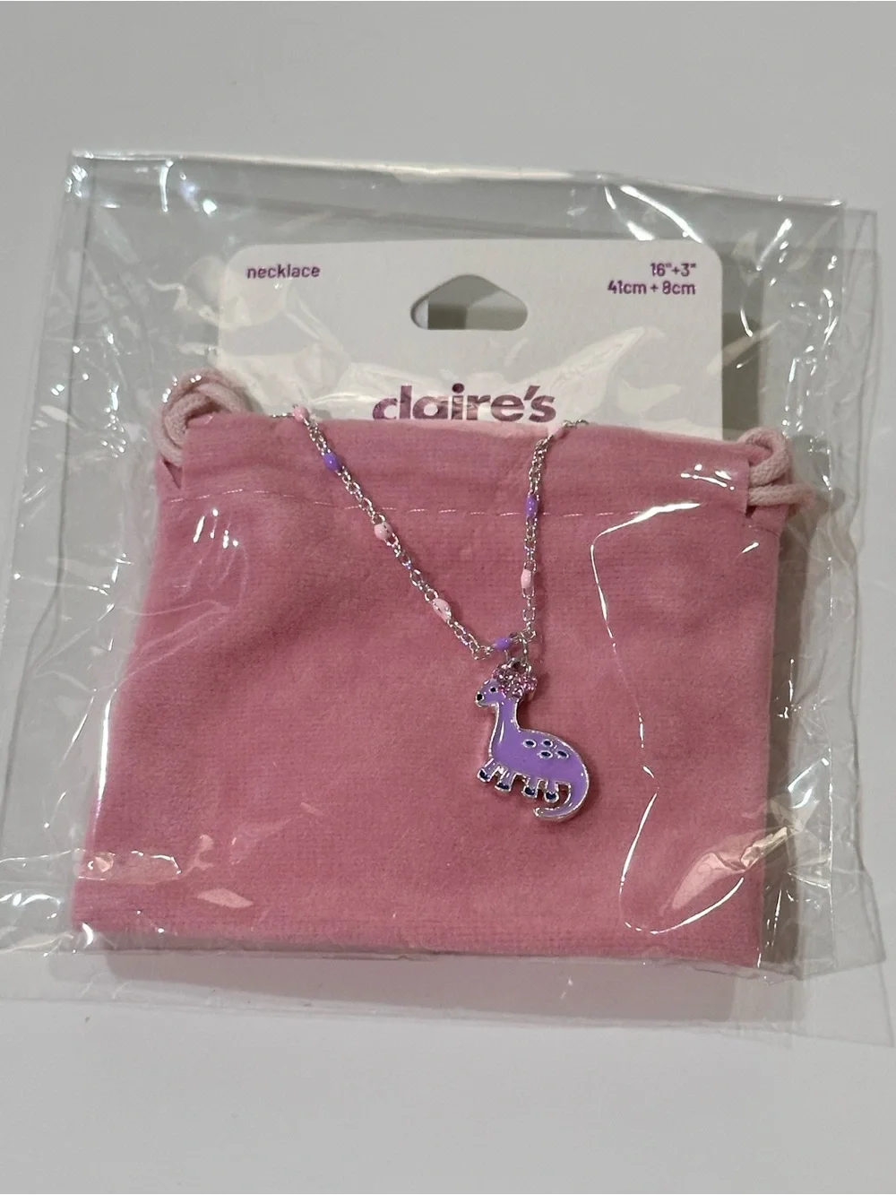 Claire's Purple Dinosaur Necklace with Pink Pouch